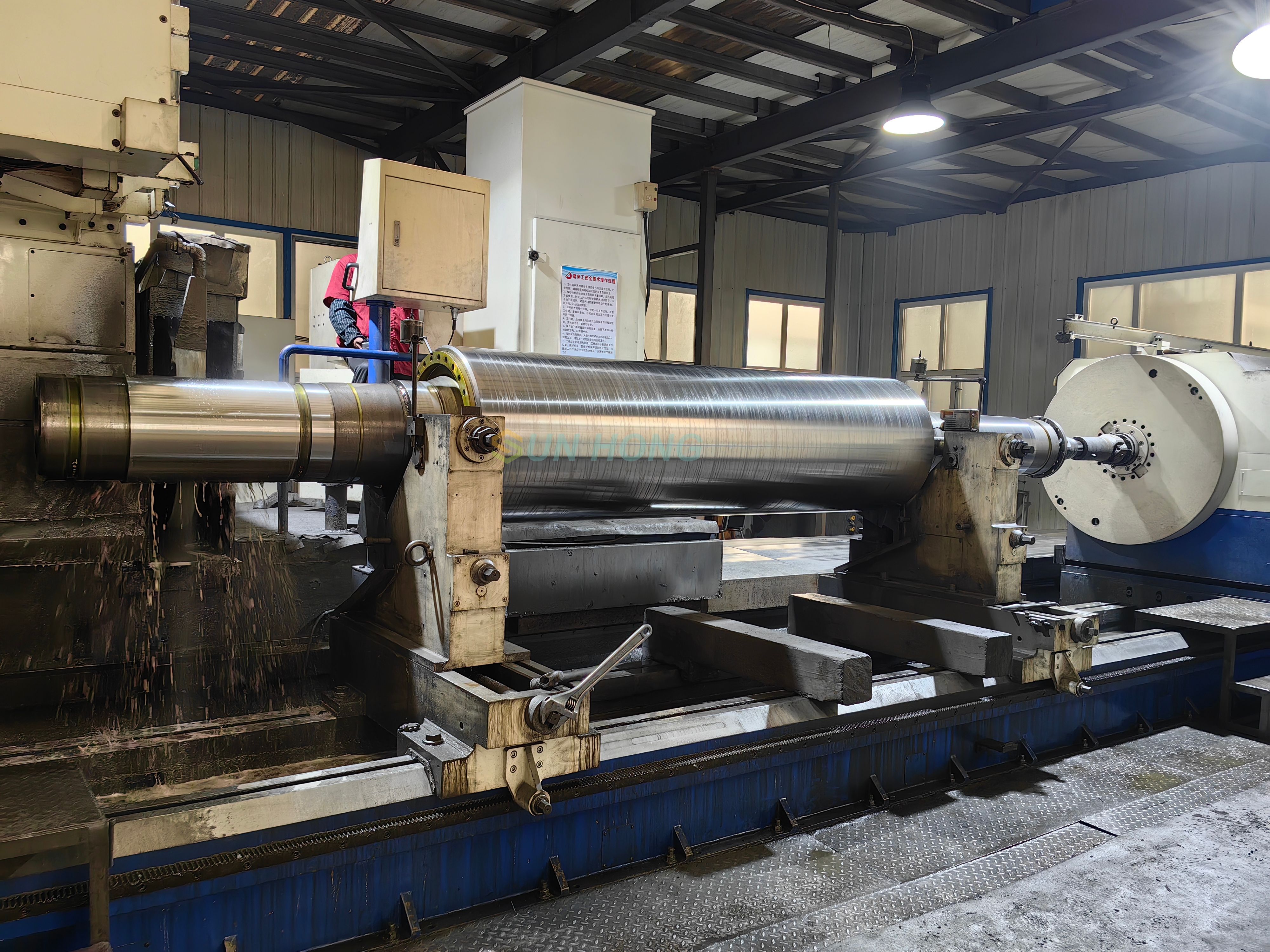 Rouleau de calandre pour calandre souple et dure