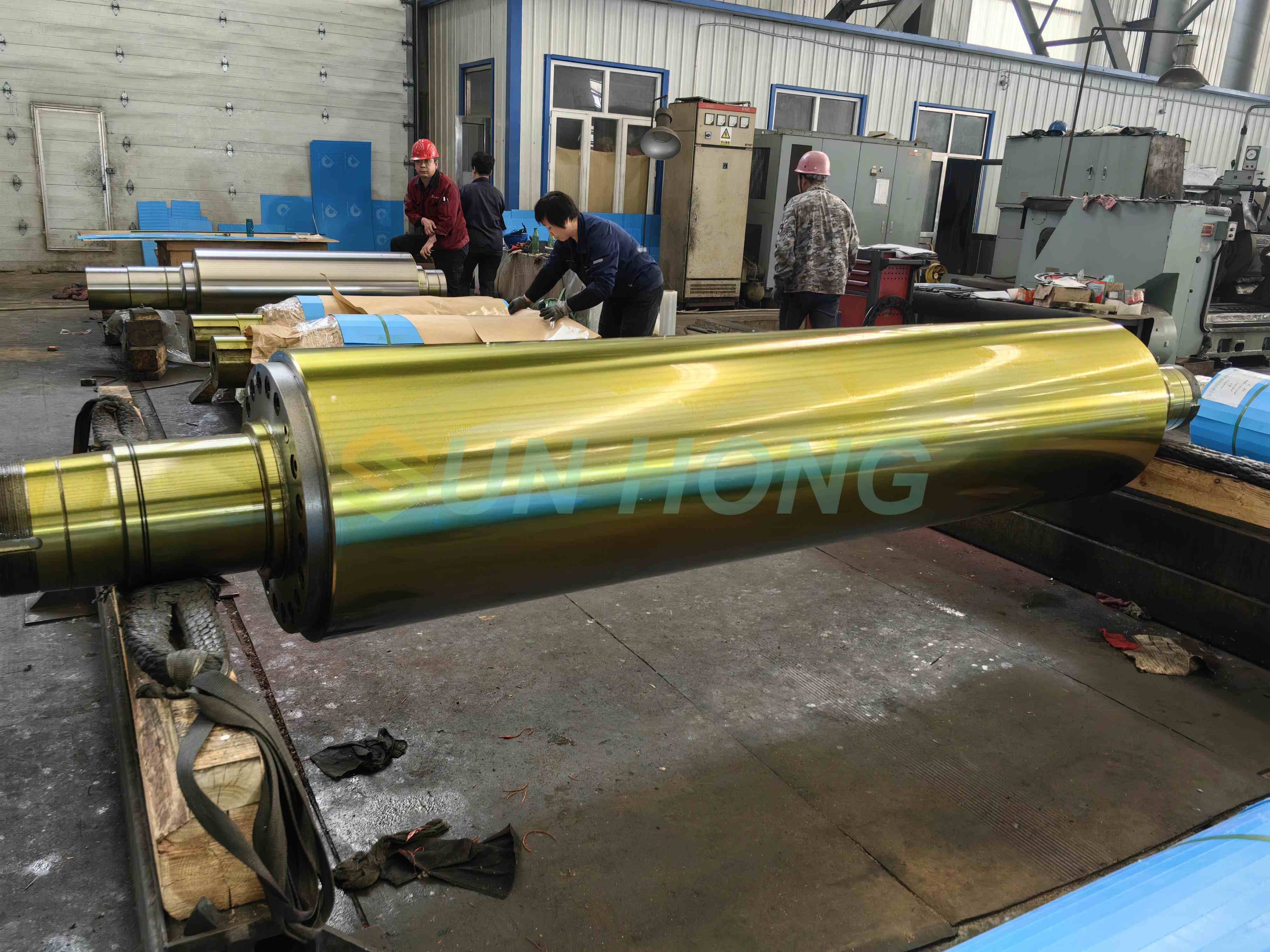 Rouleau de calandre pour calandre souple et dure